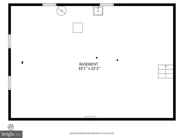 a open living room with a white wall