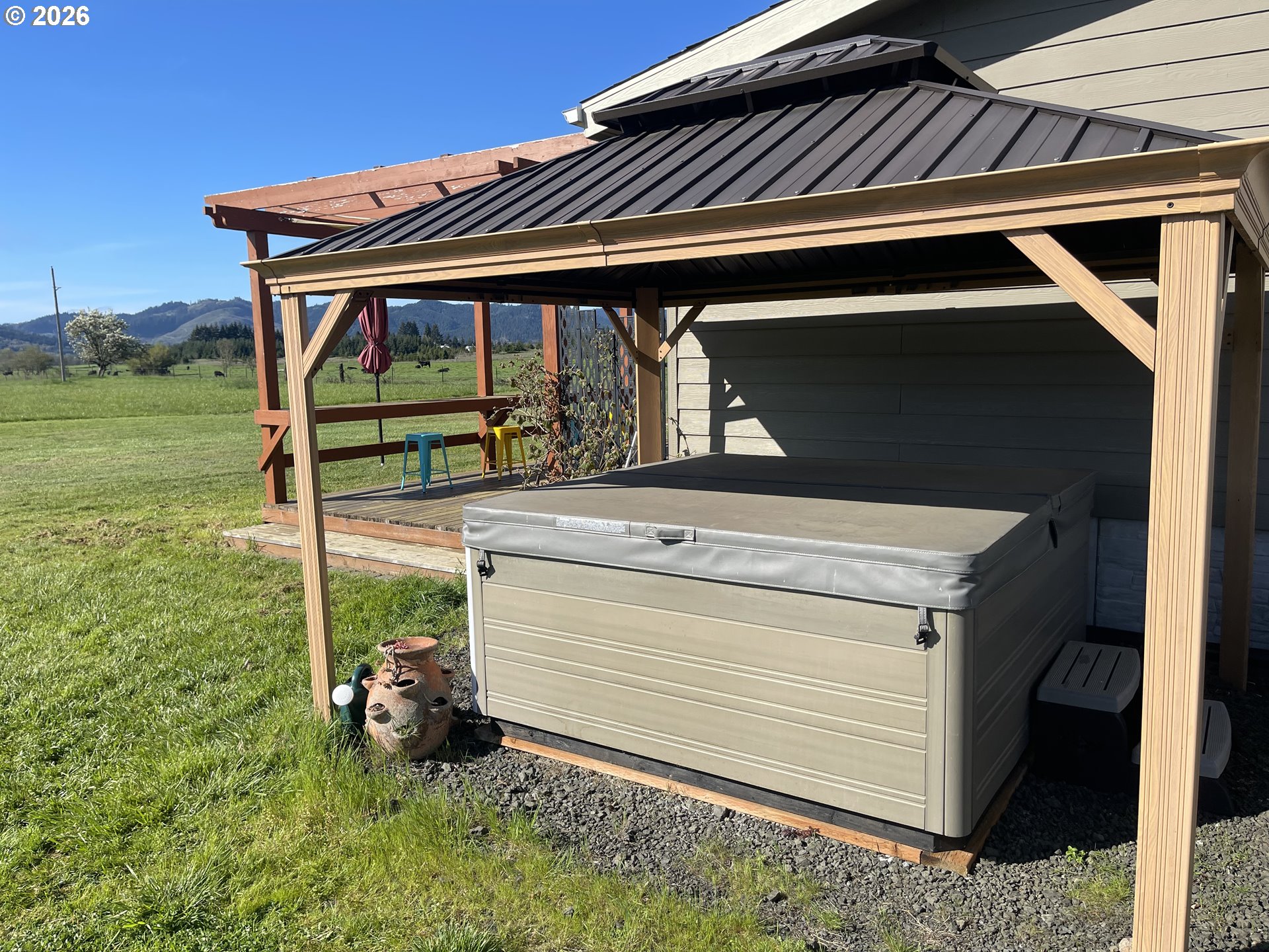 6404 Lookingglass Road Roseburg, OR 97471 - Photo 32 of 48 a view of backyard with barbeque grill and backyard