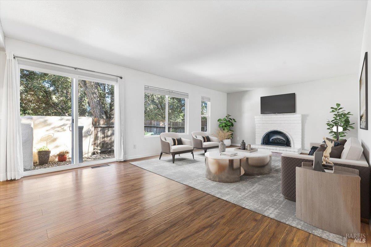 802 Adobe Drive Santa Rosa, CA 95404 - Photo 4 of 32 a living room with fireplace furniture and a large window