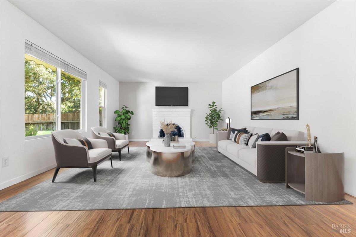 802 Adobe Drive Santa Rosa, CA 95404 - Photo 5 of 32 a living room with furniture and a fireplace