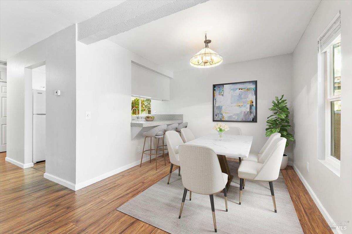 802 Adobe Drive Santa Rosa, CA 95404 - Photo 10 of 32 a view of a dining room with furniture and a window