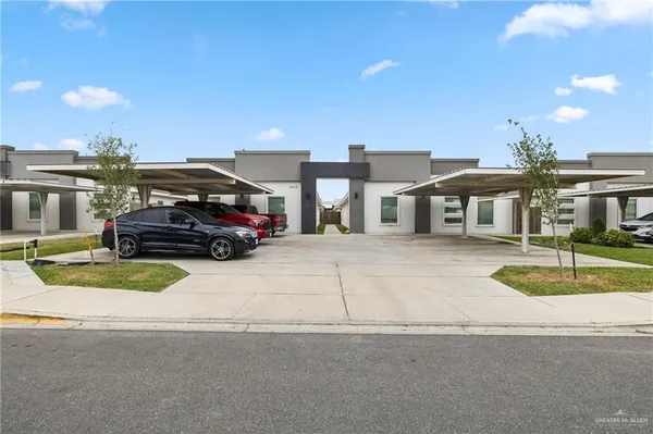 a car parked in front of a house