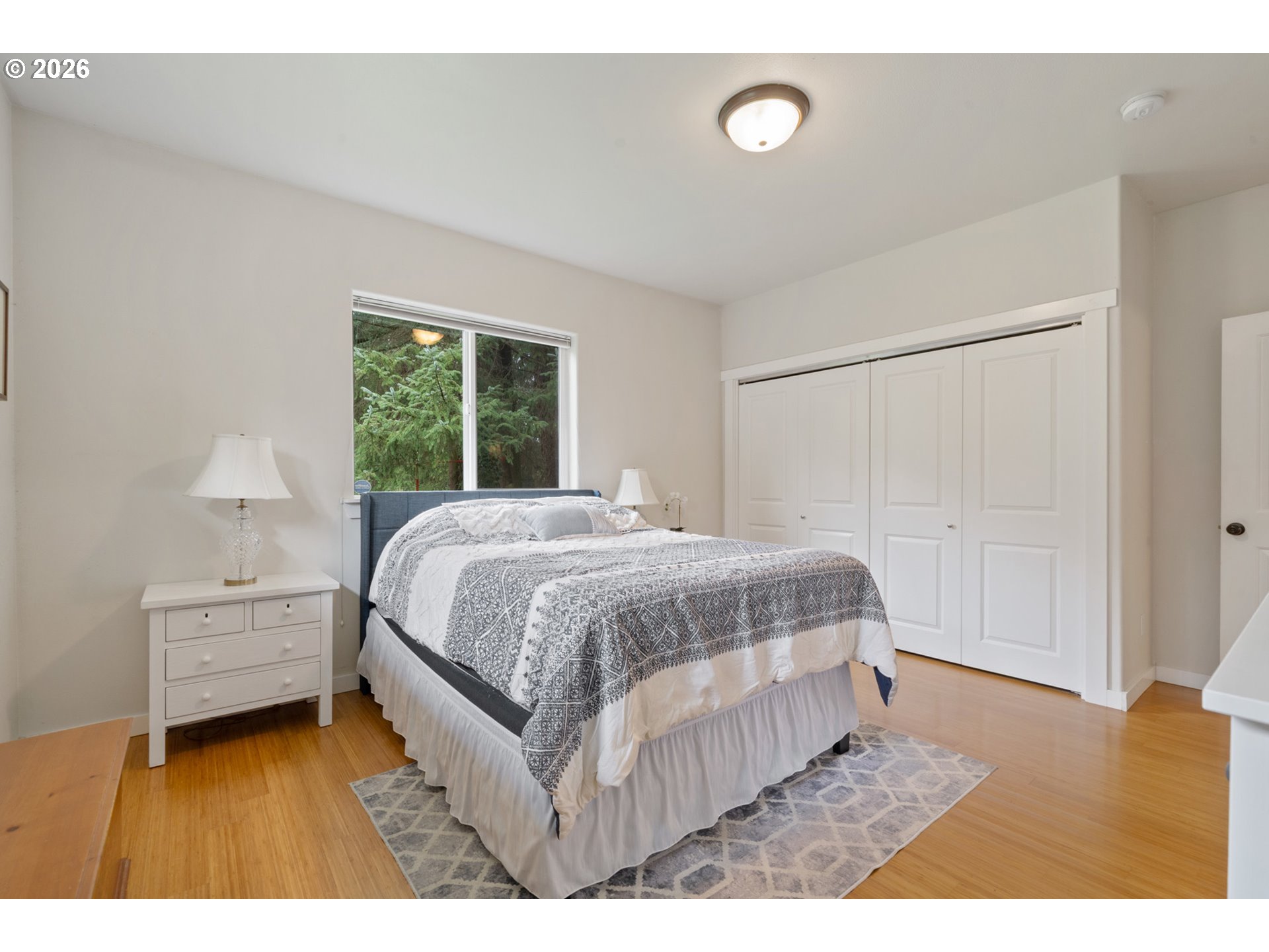 6040 Brickyard Road Tillamook, OR 97141 - Photo 14 of 41 a bedroom with a bed and a table