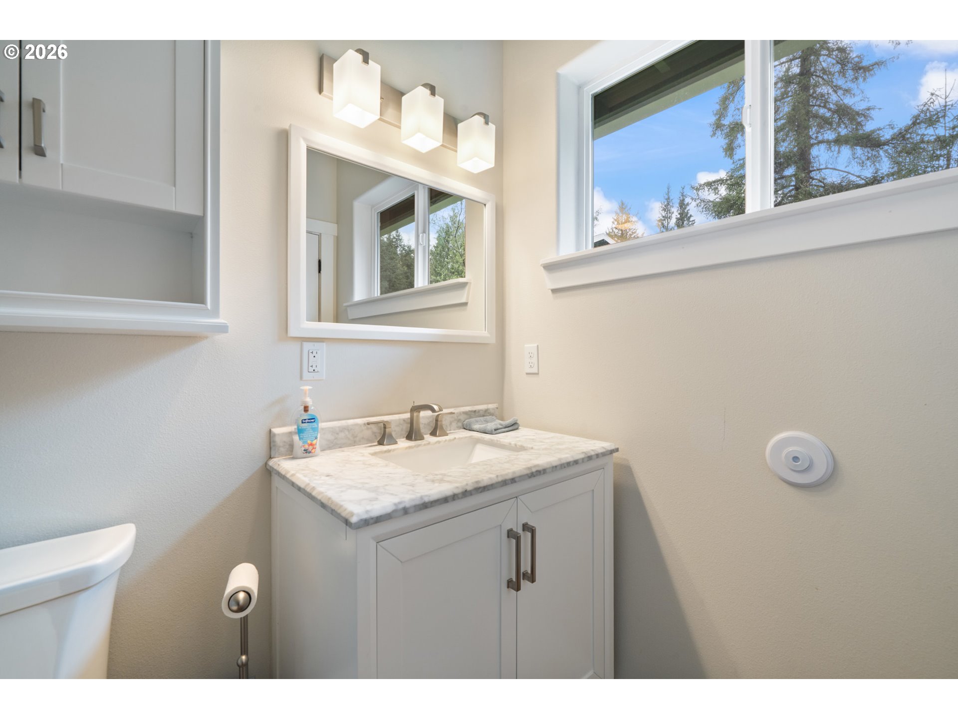 6040 Brickyard Road Tillamook, OR 97141 - Photo 17 of 41 a bathroom with a sink vanity and mirror