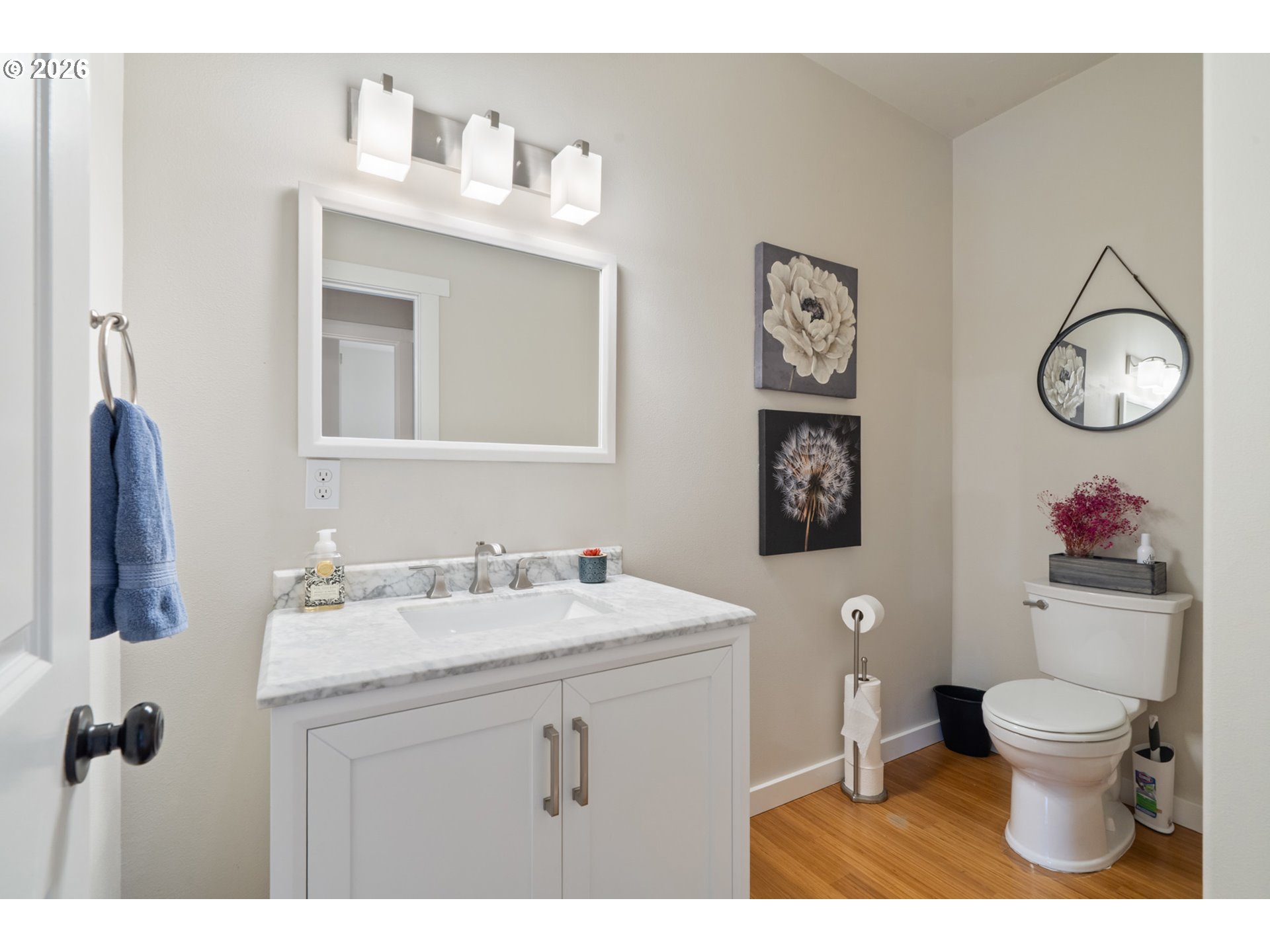6040 Brickyard Road Tillamook, OR 97141 - Photo 20 of 41 a bathroom with a toilet sink and mirror