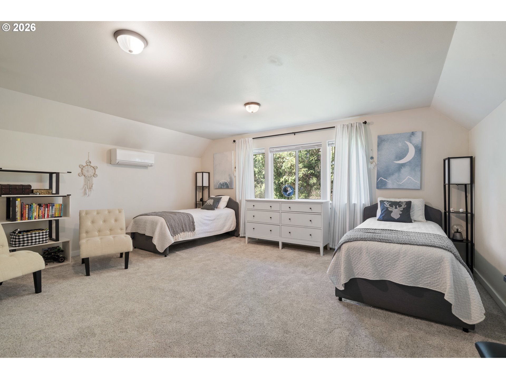 6040 Brickyard Road Tillamook, OR 97141 - Photo 28 of 41 a spacious bedroom with a bed couch and window