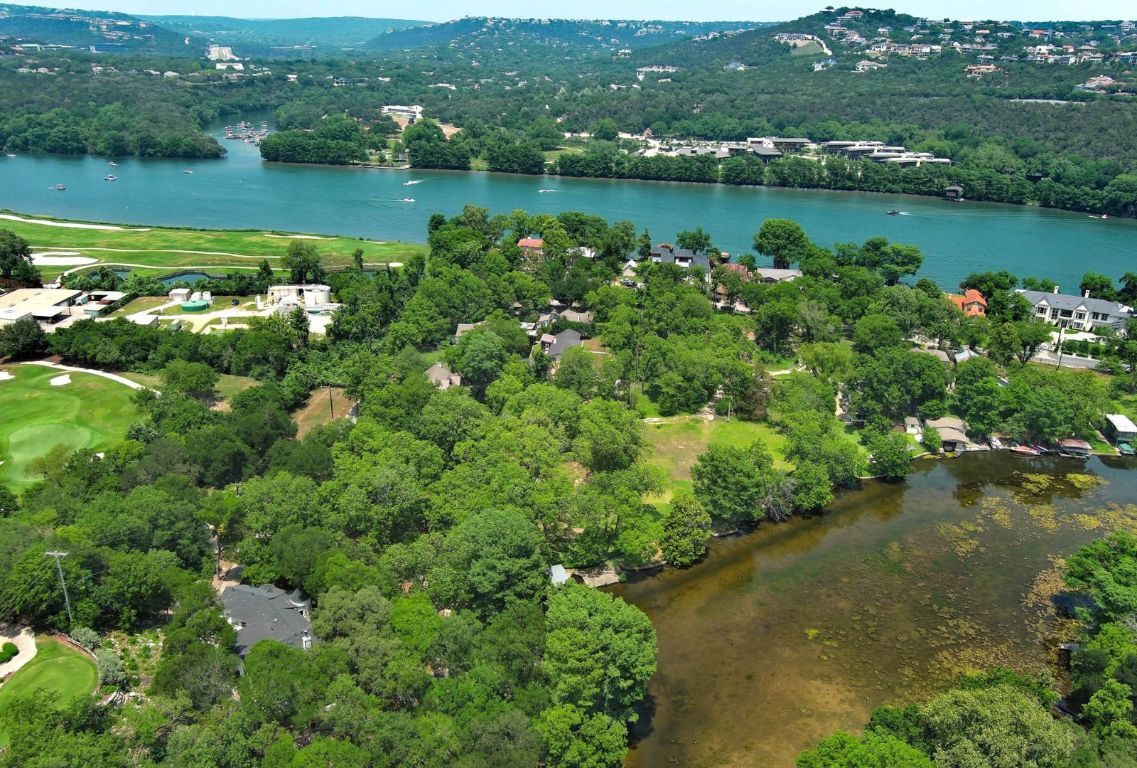 4703 Laguna Lane Austin, TX 78746 - Photo 26 of 32 an aerial view of a houses with a lake view
