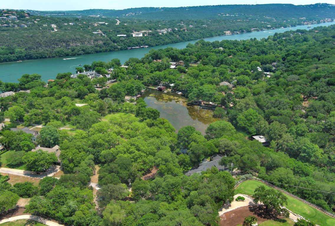 4703 Laguna Lane Austin, TX 78746 - Photo 27 of 32 an aerial view of a houses with a lake view