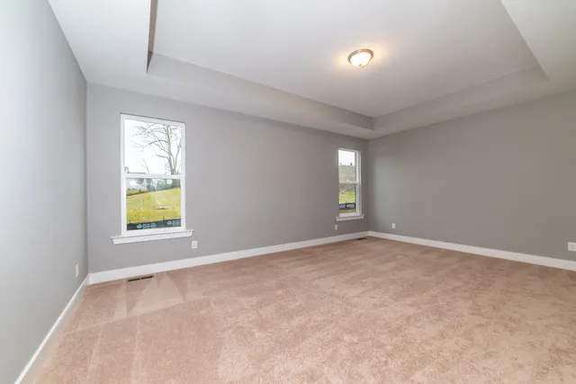 an empty room with windows