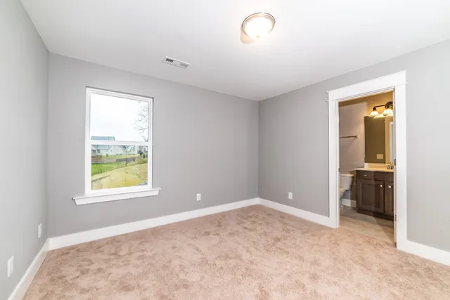 a view of a room that has a window in it