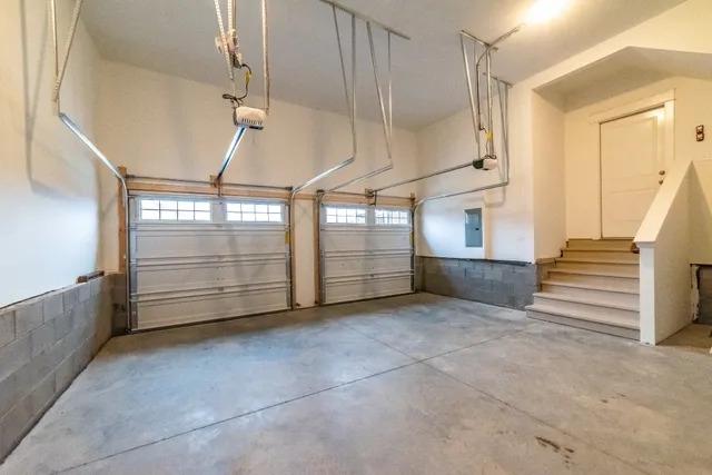 a view of an empty room with stairs