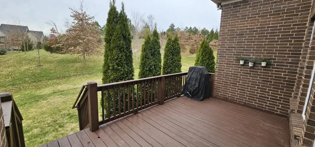 a view of a balcony with an outdoor space