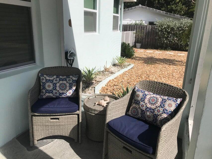 7 Belair Drive Boynton Beach, FL 33435 - Photo 8 of 19 front patio