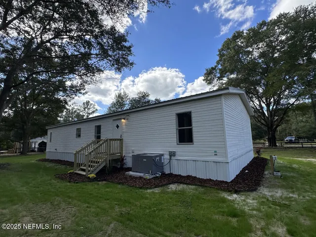 a view of a backyard with a garden