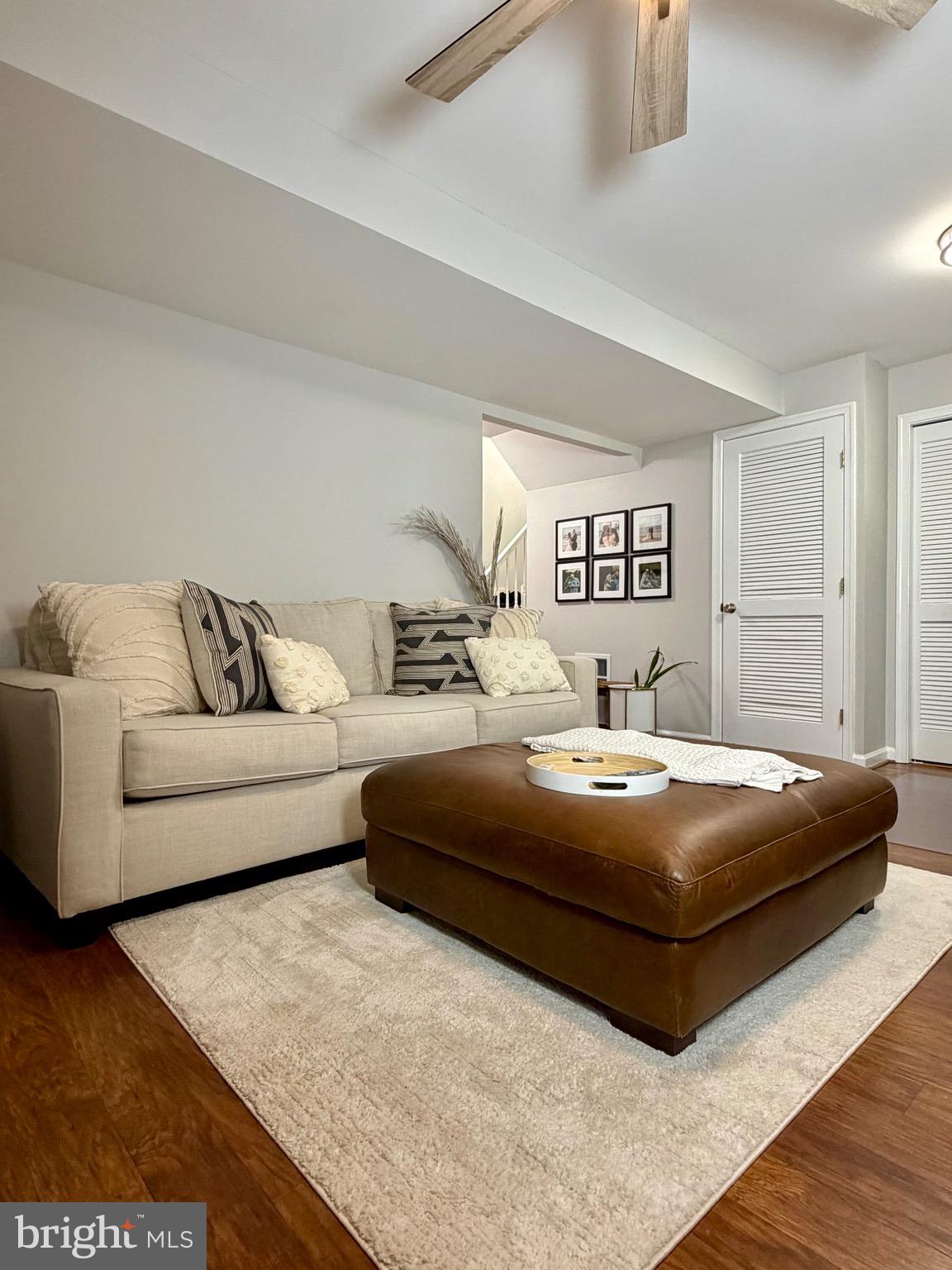 7108 Wheeling Way Gainesville, VA 20155 - Photo 6 of 45 a bedroom with a bed and a couch
