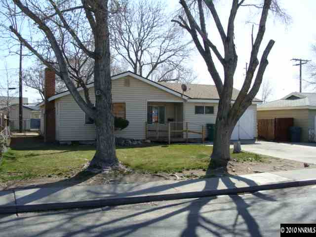 1570 Harvard Way Reno, NV 89502 - Photo 1 of 7 a view of a yard with small tree