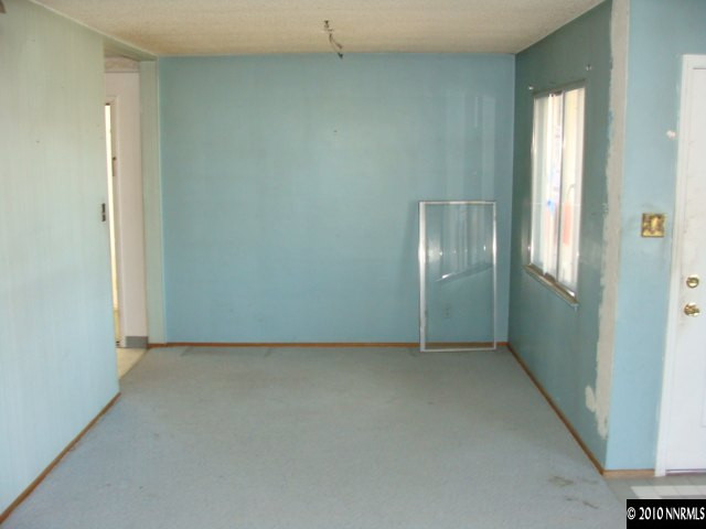 1570 Harvard Way Reno, NV 89502 - Photo 3 of 7 an empty room with windows