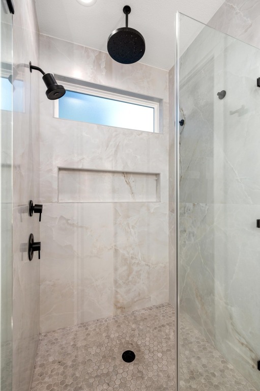 2104 East 2nd Street, Unit 1 Austin, TX 78702 - Photo 18 of 39 a bathroom with a shower