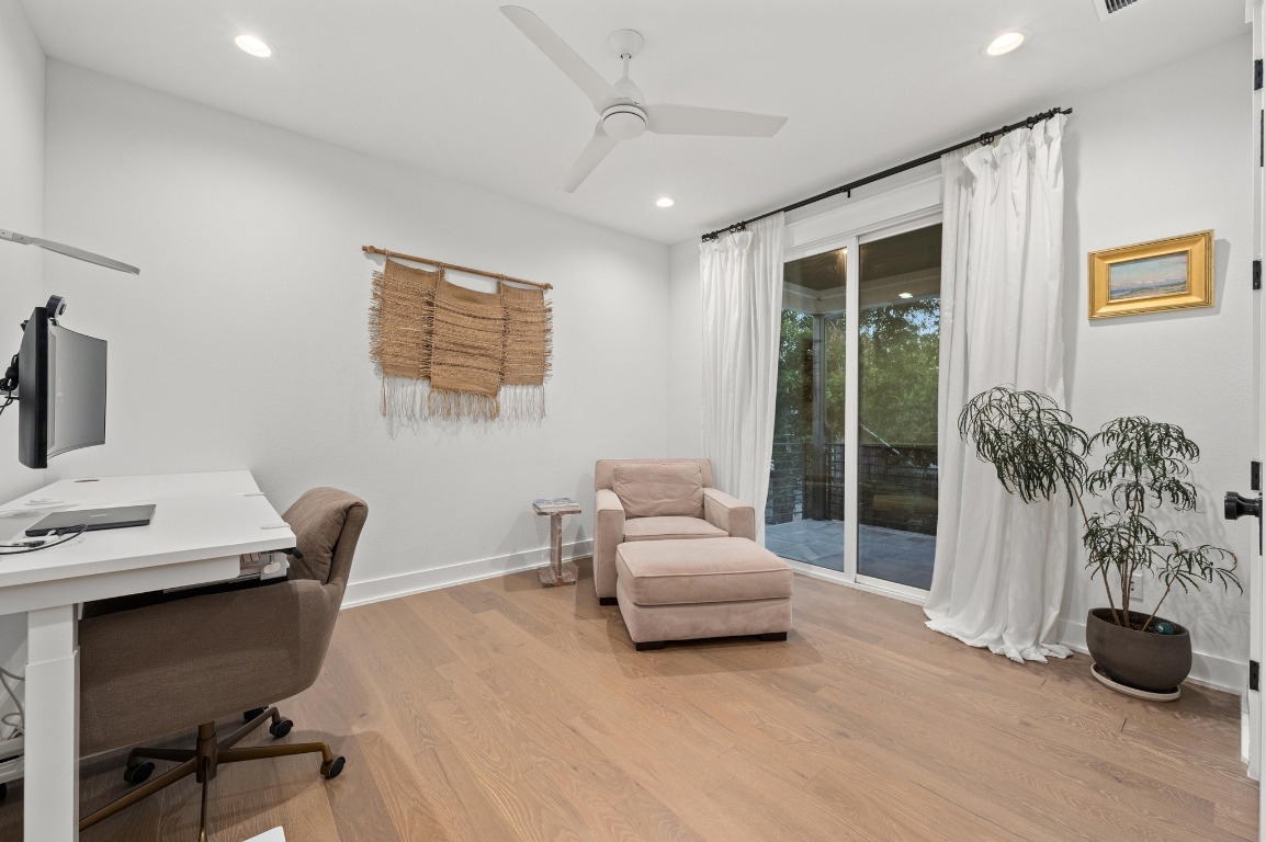 2104 East 2nd Street, Unit 1 Austin, TX 78702 - Photo 21 of 39 a living room with furniture and a potted plant