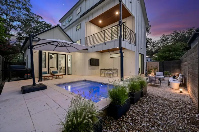 a view of a chairs and tables in the patio