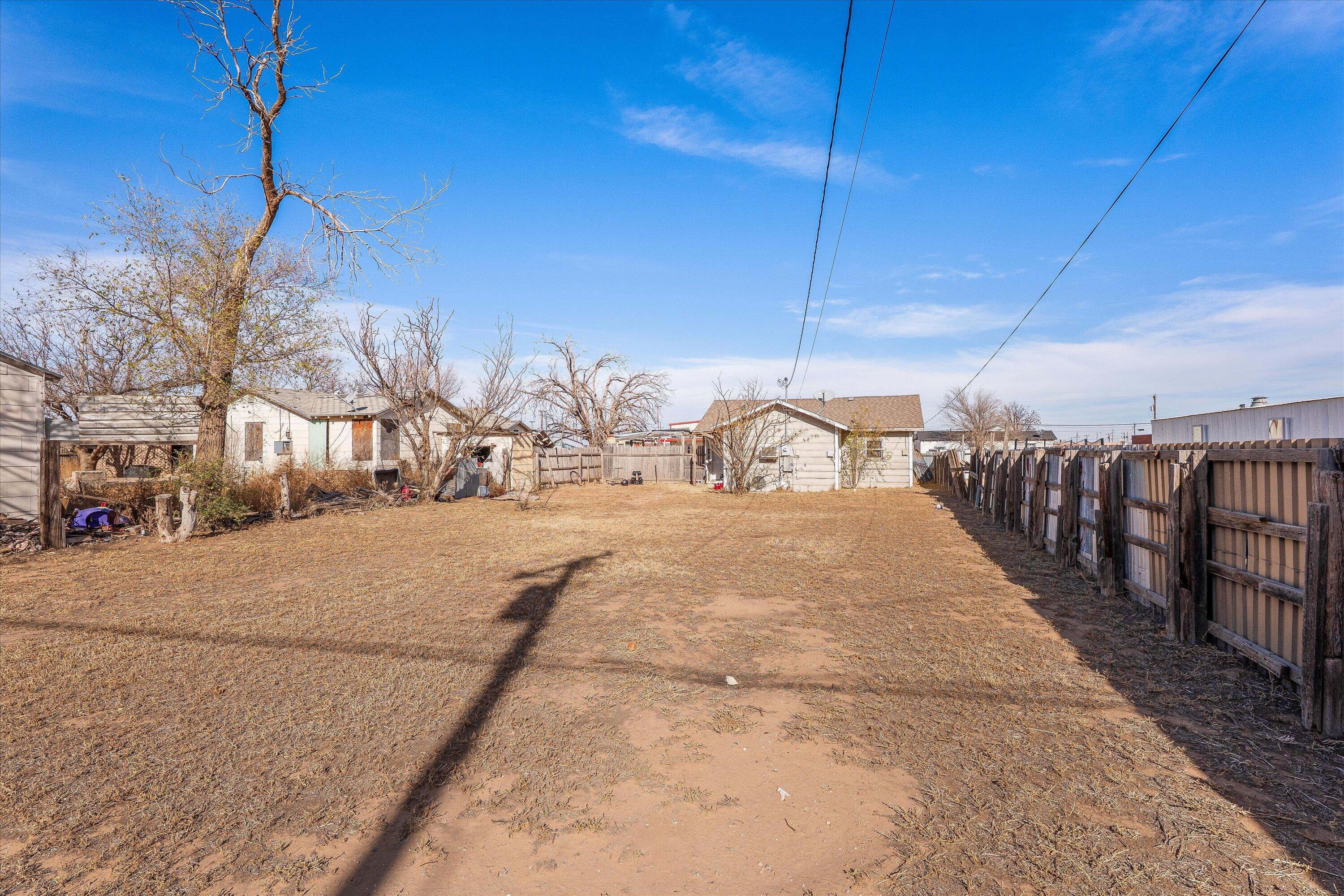 204 Austin Street Levelland, TX 79336 - Photo 13 of 13 a view of a house with a snow on the road