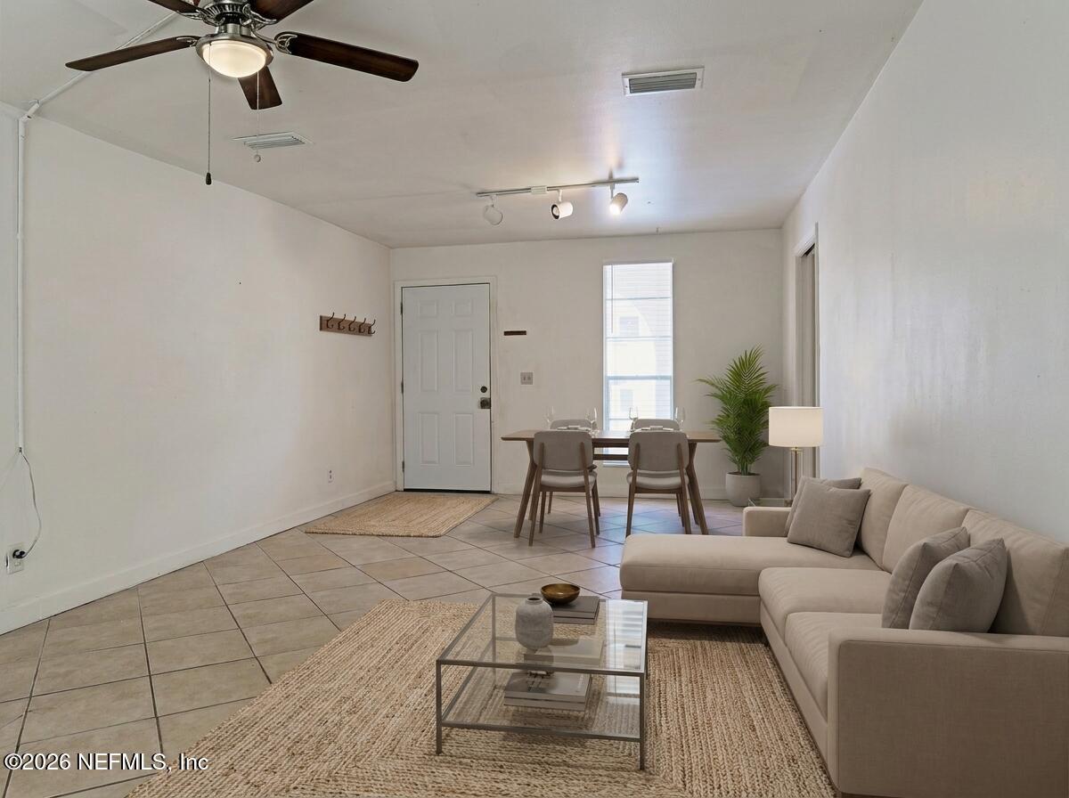 1557 El Prado Road, Unit 1 Jacksonville, FL 32216 - Photo 4 of 28 living-dining-staged