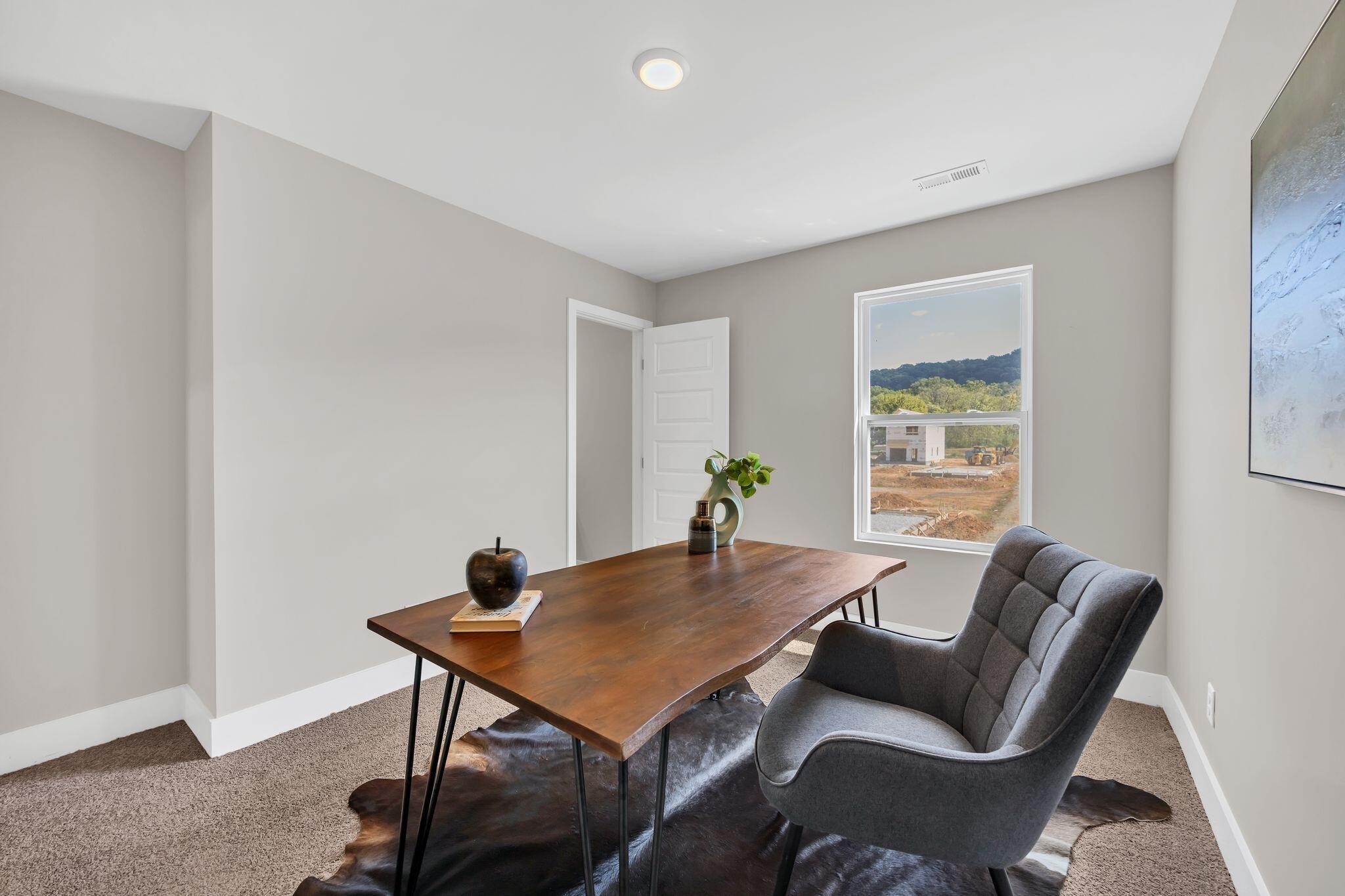 2413 East 17th Street Chattanooga, TN 37404 - Photo 34 of 42 a view of a dining room with furniture