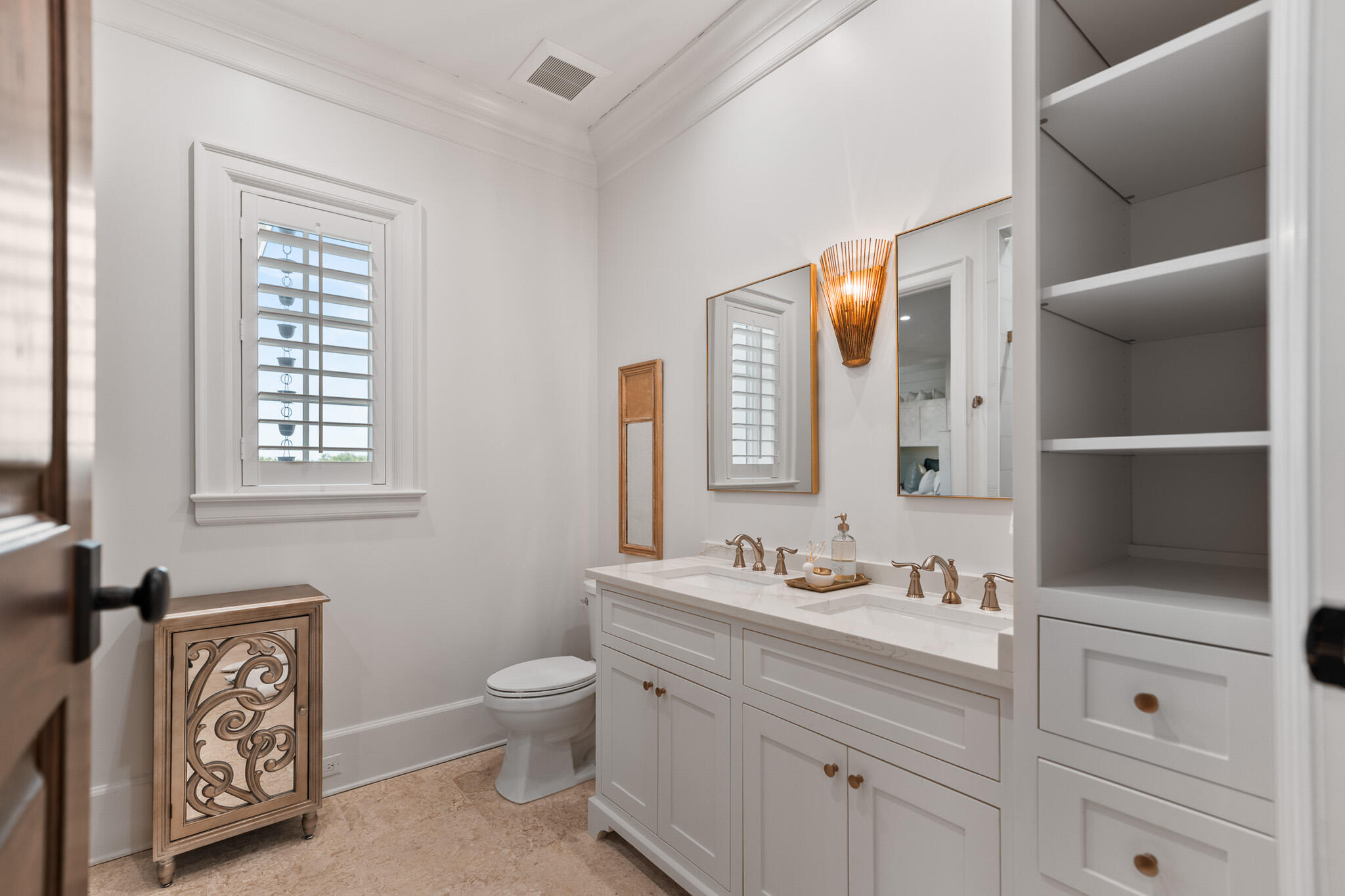 756 Blue Mountain Road Santa Rosa Beach, FL 32459 - Photo 42 of 86 a bathroom with a toilet sink and mirror