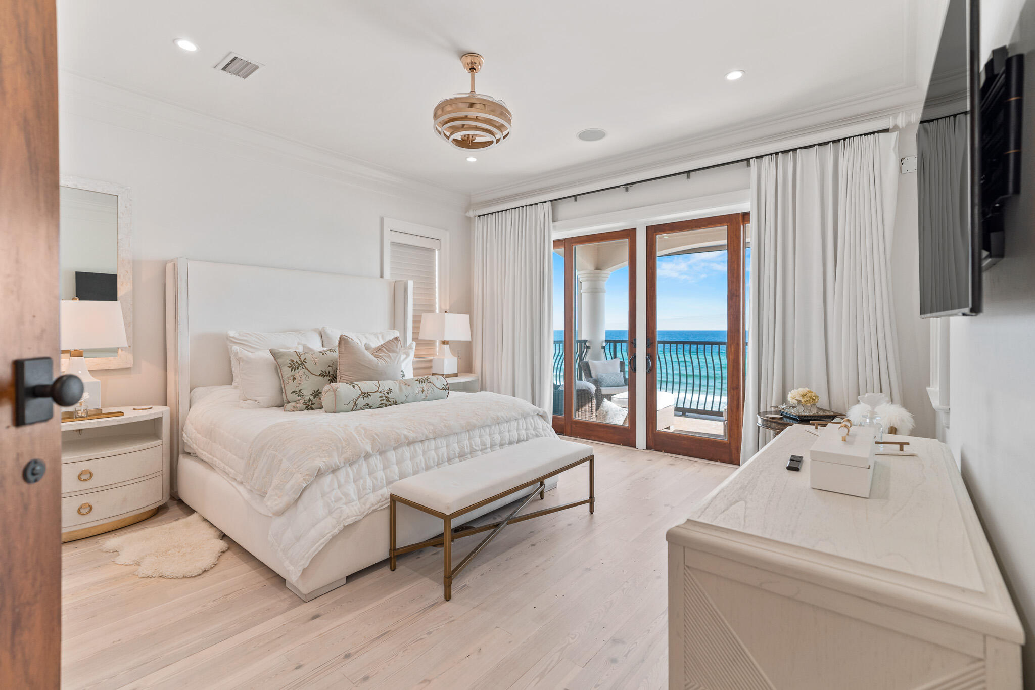 756 Blue Mountain Road Santa Rosa Beach, FL 32459 - Photo 51 of 86 a spacious bedroom with a bed and a large window