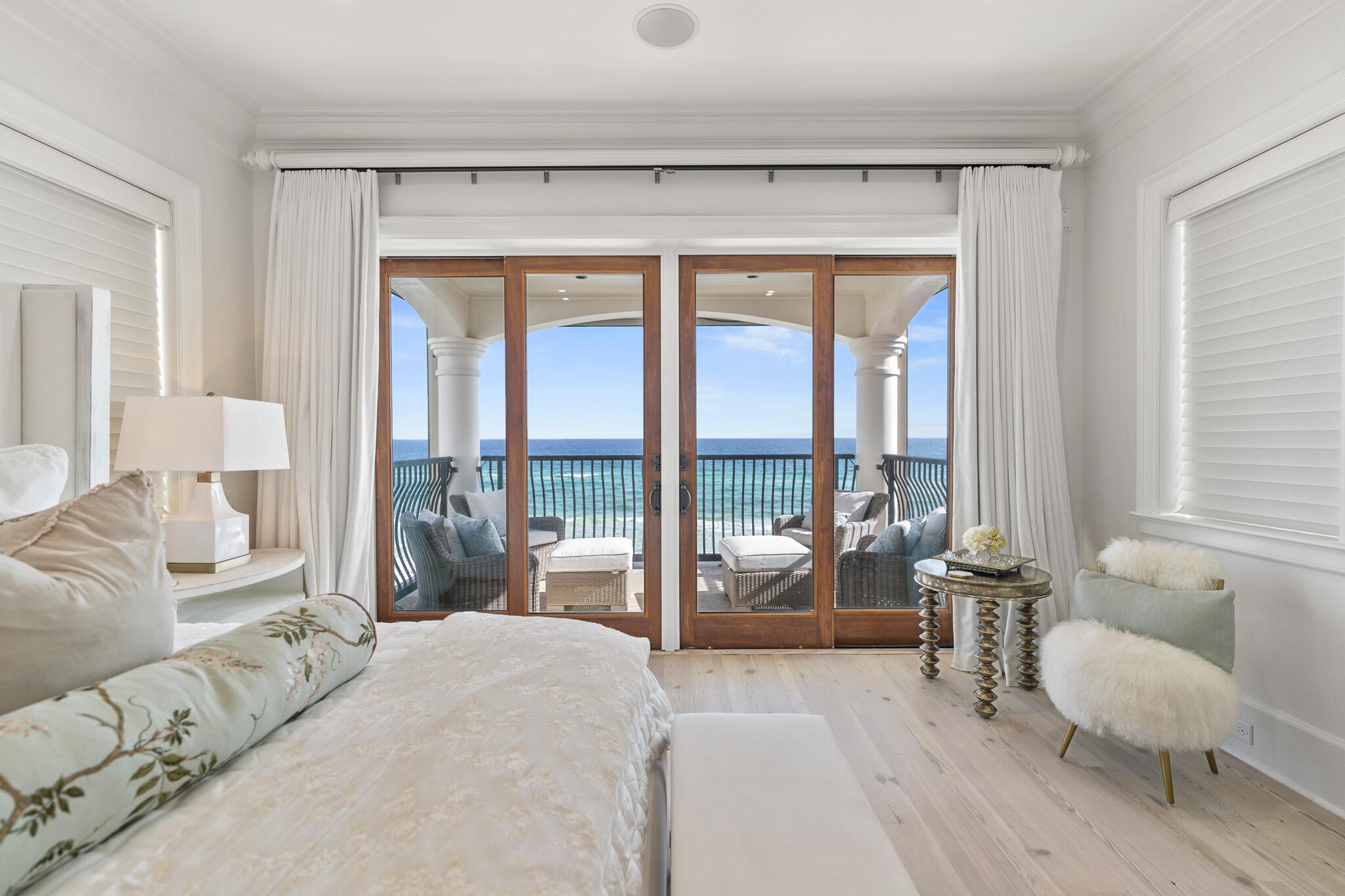 756 Blue Mountain Road Santa Rosa Beach, FL 32459 - Photo 60 of 86 a spacious bedroom with a bed and glass window