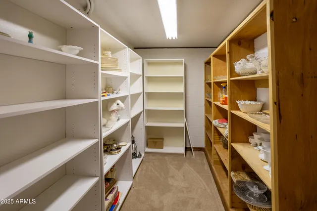 a bathroom with 2 sink and a mirror