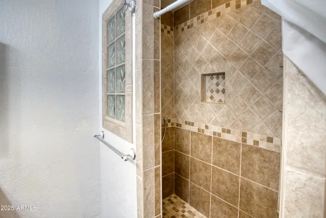 a bath tub sitting in a bathroom