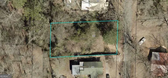 a view of balcony with wooden floor and fence
