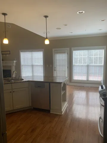 a kitchen with sink and window