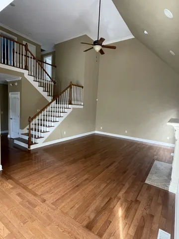 a view of entryway with wooden floor