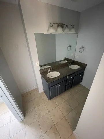 a room with a table and chairs