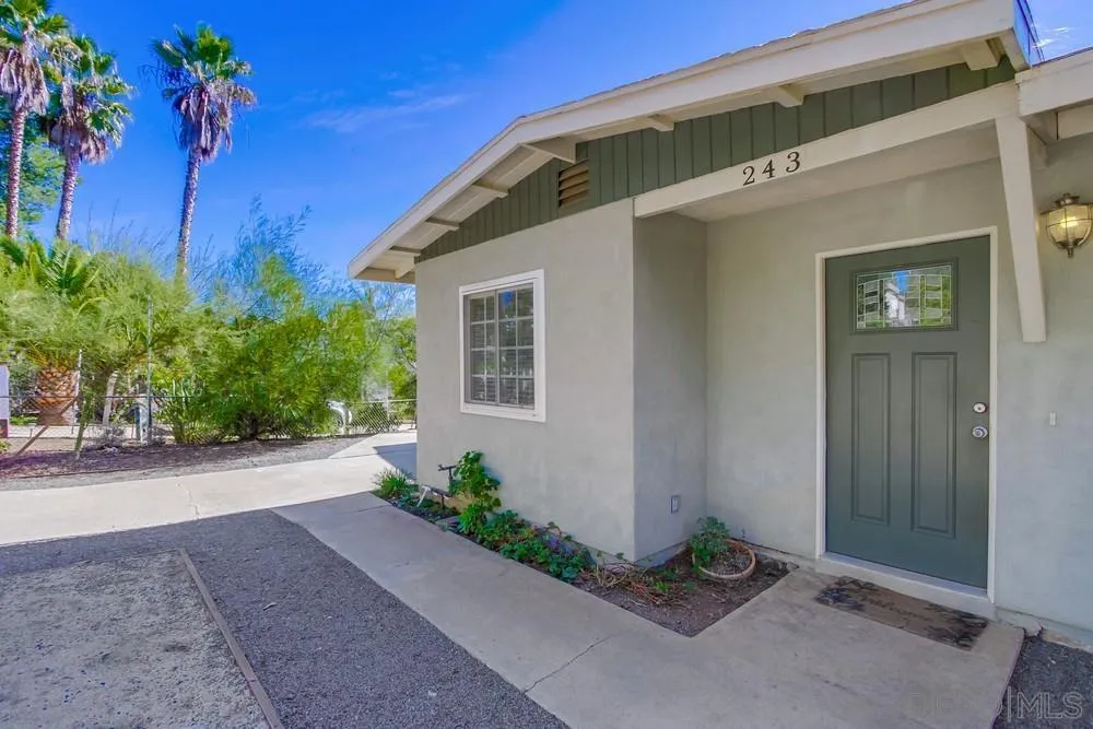 243 East View Street Fallbrook, CA 92028 - Photo 4 of 50 a front view of a house with a yard
