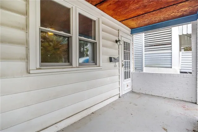 a view of a house with a large window