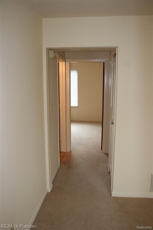 409 West Highland Road, Unit 18 Howell, MI 48843 - Photo 20 of 35 View to hall