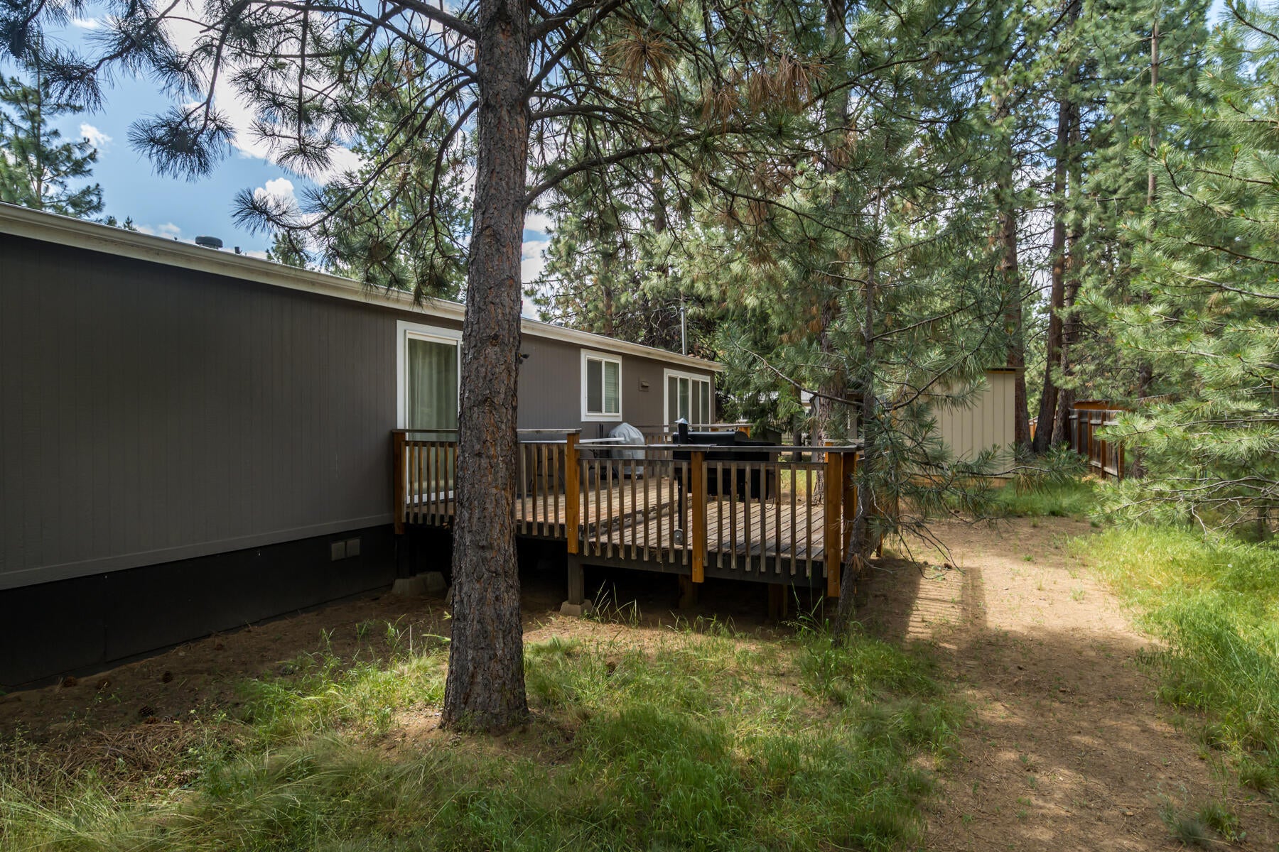 60477 Pima Road Bend, OR 97702 - Photo 7 of 25 Backyard with large deck