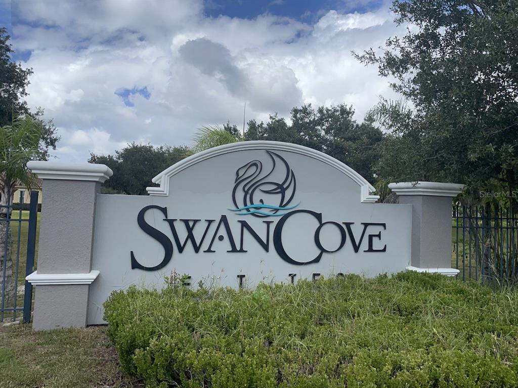 11 Trumpeter Court Odessa, FL 33556 - Photo 2 of 7 a sign that is on the wall of a building