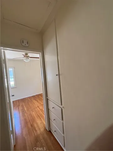 view of room with window and wooden floor