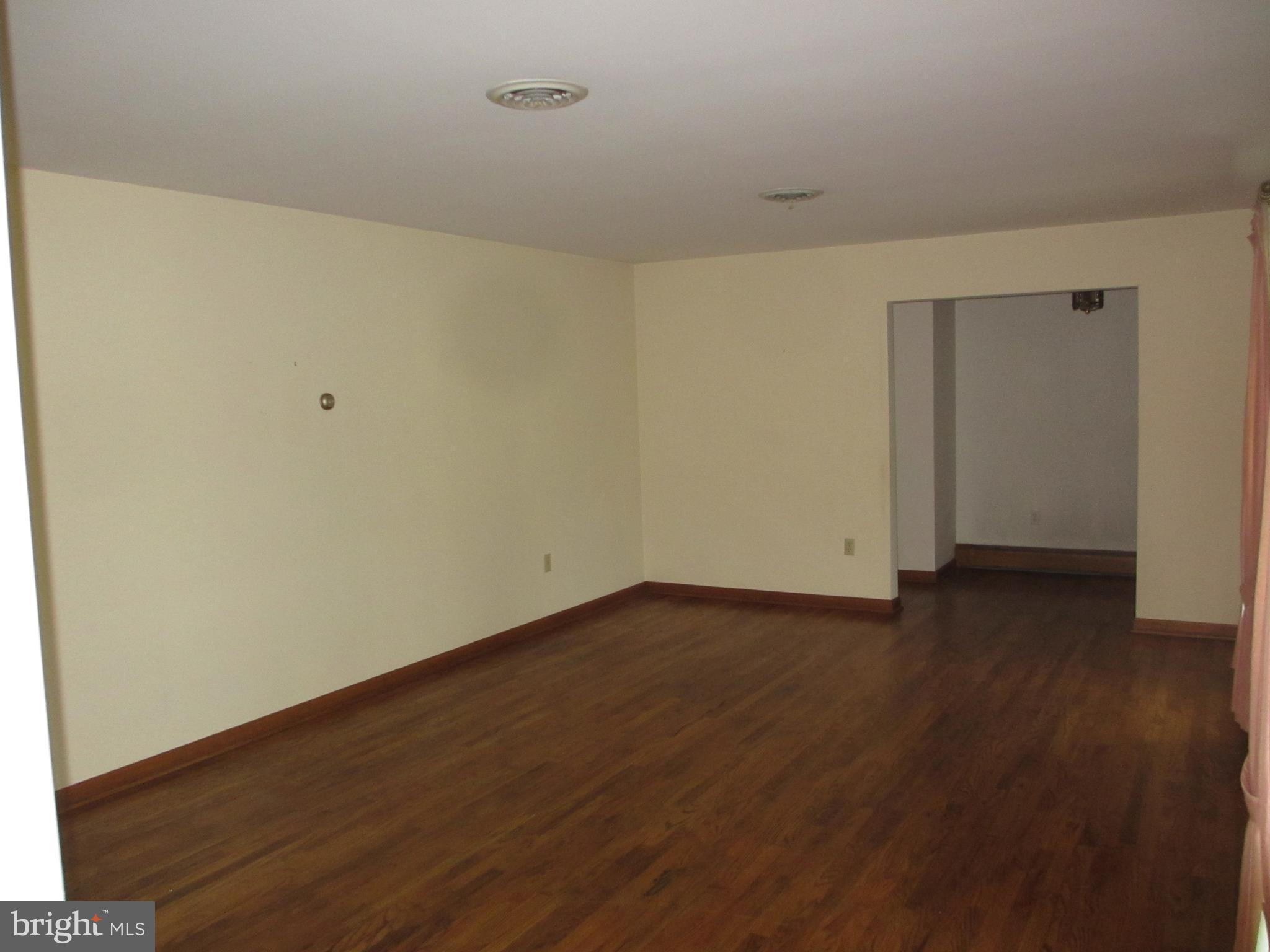 16 Nellies Corner Road Rising Sun, MD 21911 - Photo 17 of 25 a view of an empty room with wooden floor