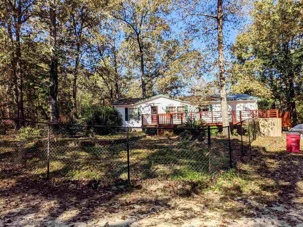 715 Morris Stevens Road Macon, GA 31217 - Photo 1 of 1 a view of a yard with large trees