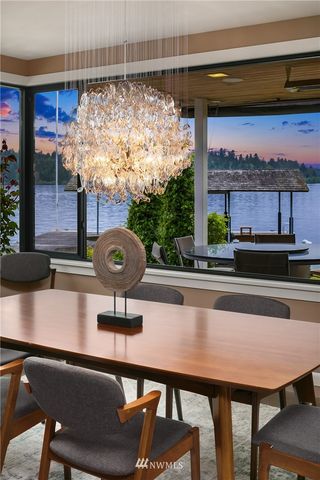 a view of a chairs and table in a room