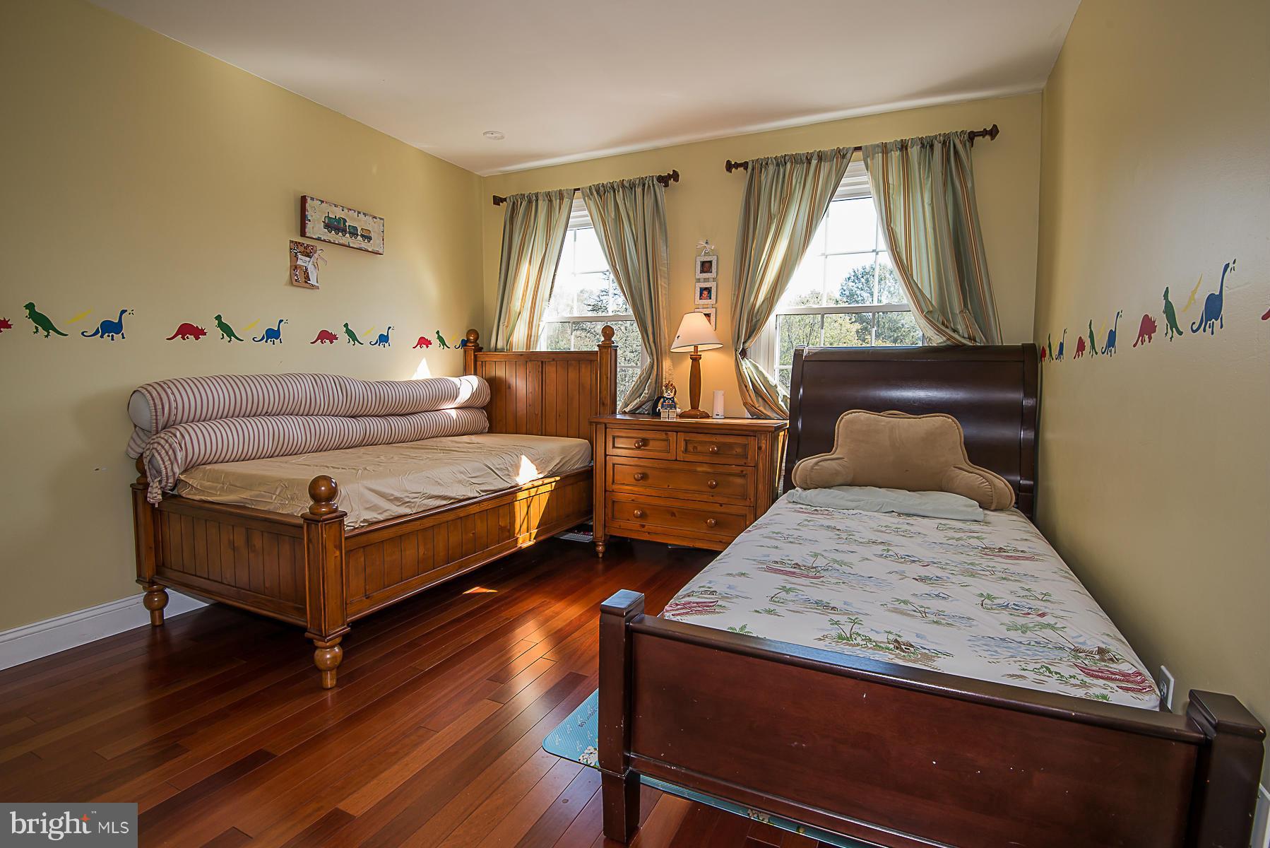 4050 Macalpine Road Ellicott City, MD 21042 - Photo 22 of 30 a bedroom with a bed and window