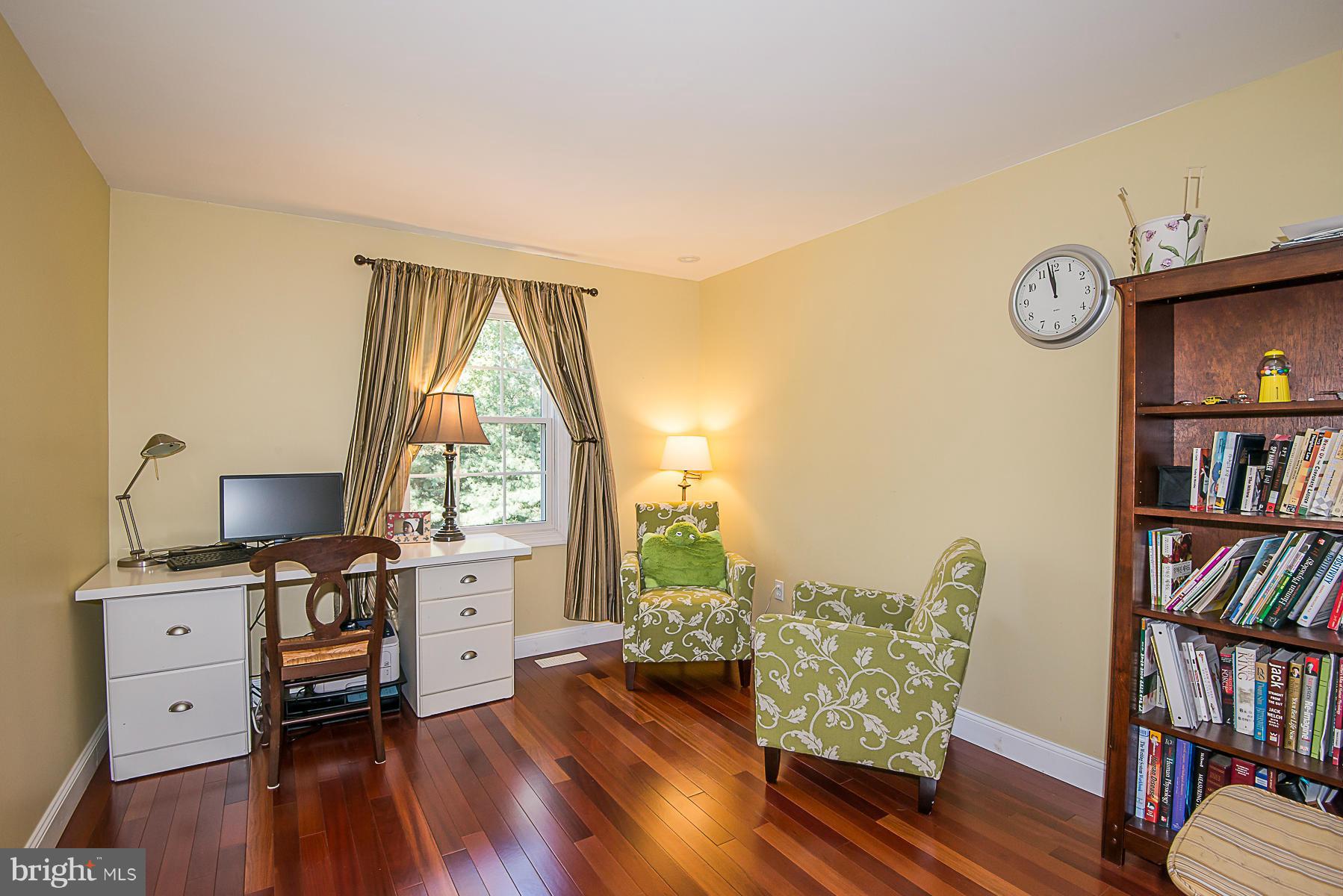 4050 Macalpine Road Ellicott City, MD 21042 - Photo 23 of 30 a living room with furniture and a flat screen tv