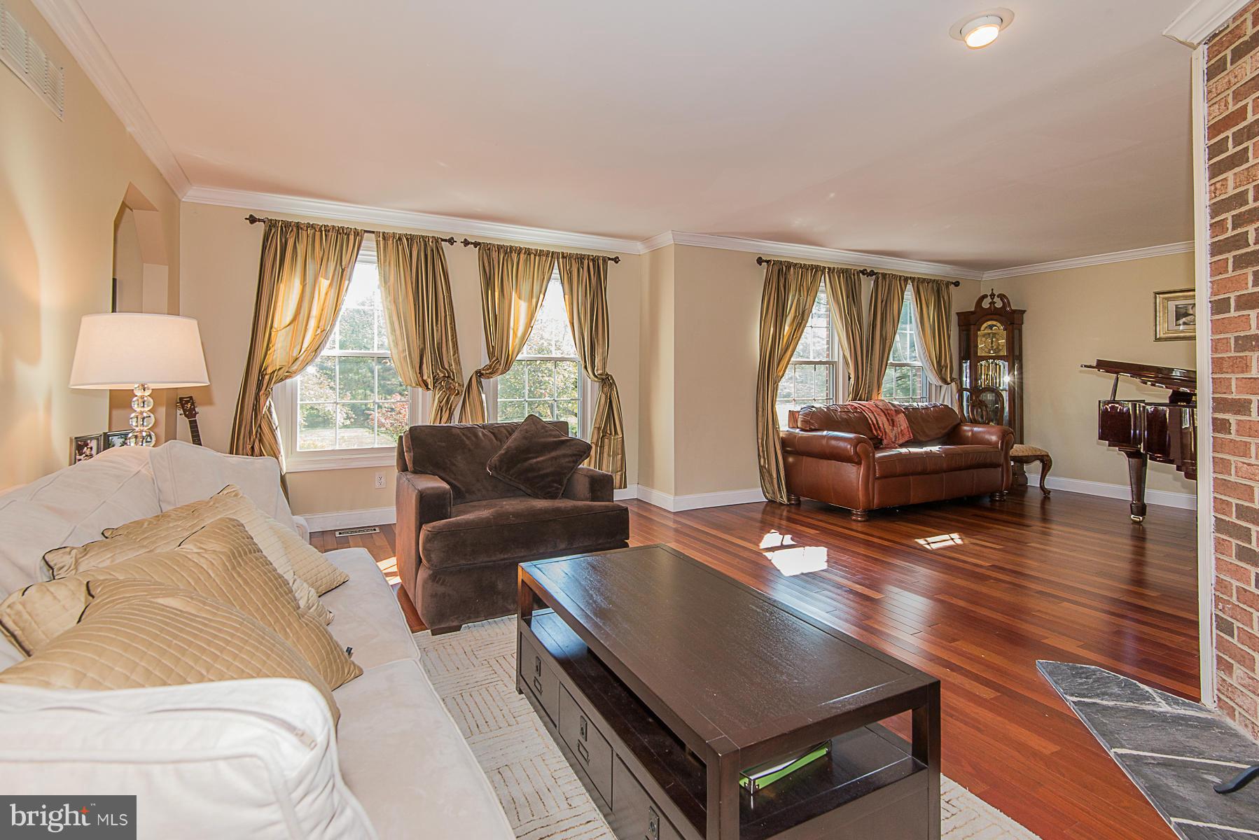 4050 Macalpine Road Ellicott City, MD 21042 - Photo 4 of 30 a living room with furniture and a large window