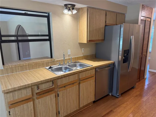 a close view of a utility room with washer and dryer