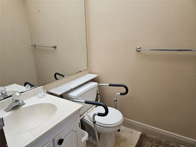 a bathroom with a sink and a toilet